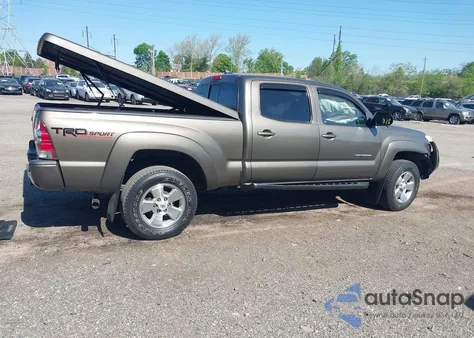 2015 Toyota Tacoma Base V6 из США, поврежденный, VIN 3TMMU4FN5FM082376